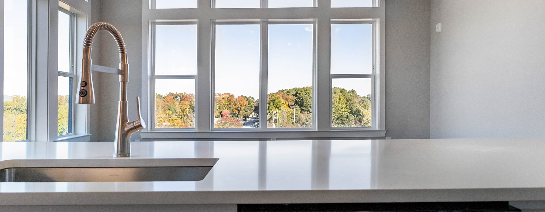 a kitchen island with a sink