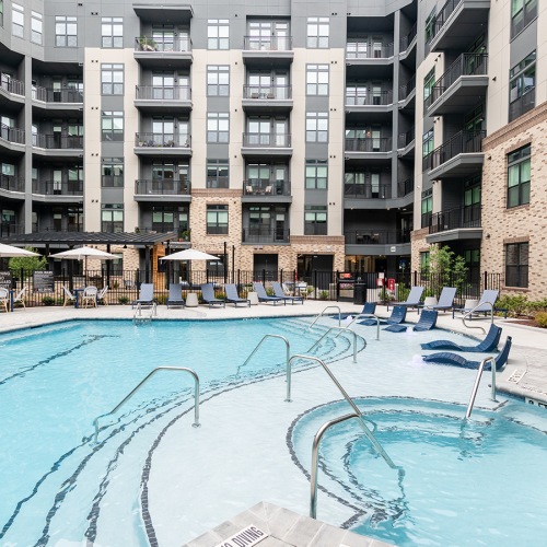 pool with lounge seating