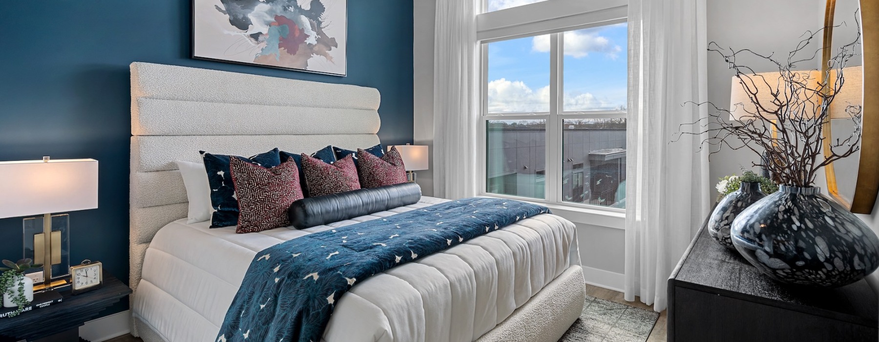 Bedroom with natural lighting and high ceilings